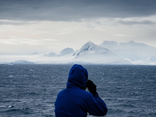 Passenger Looking Across at Mountains, Jougla Point, Antarctica, Matt Horspool